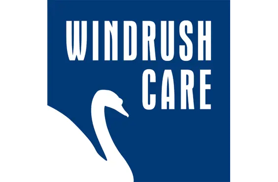 Windrush Care - A company logo