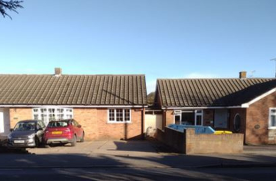 Henderson and Harvard - An outside view of the home