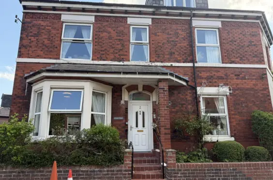 Rushes House Care Home - An outside view of the home